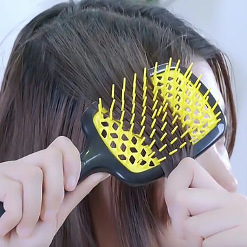 Peigne à coussin d'air pour le massage des cheveux